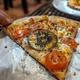UNISAT•MAKES•PIZZA logo