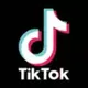 TIKTOK•DOT•COM logo
