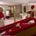 coffin wif pope logo