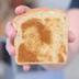FIRST ELON TOAST logo